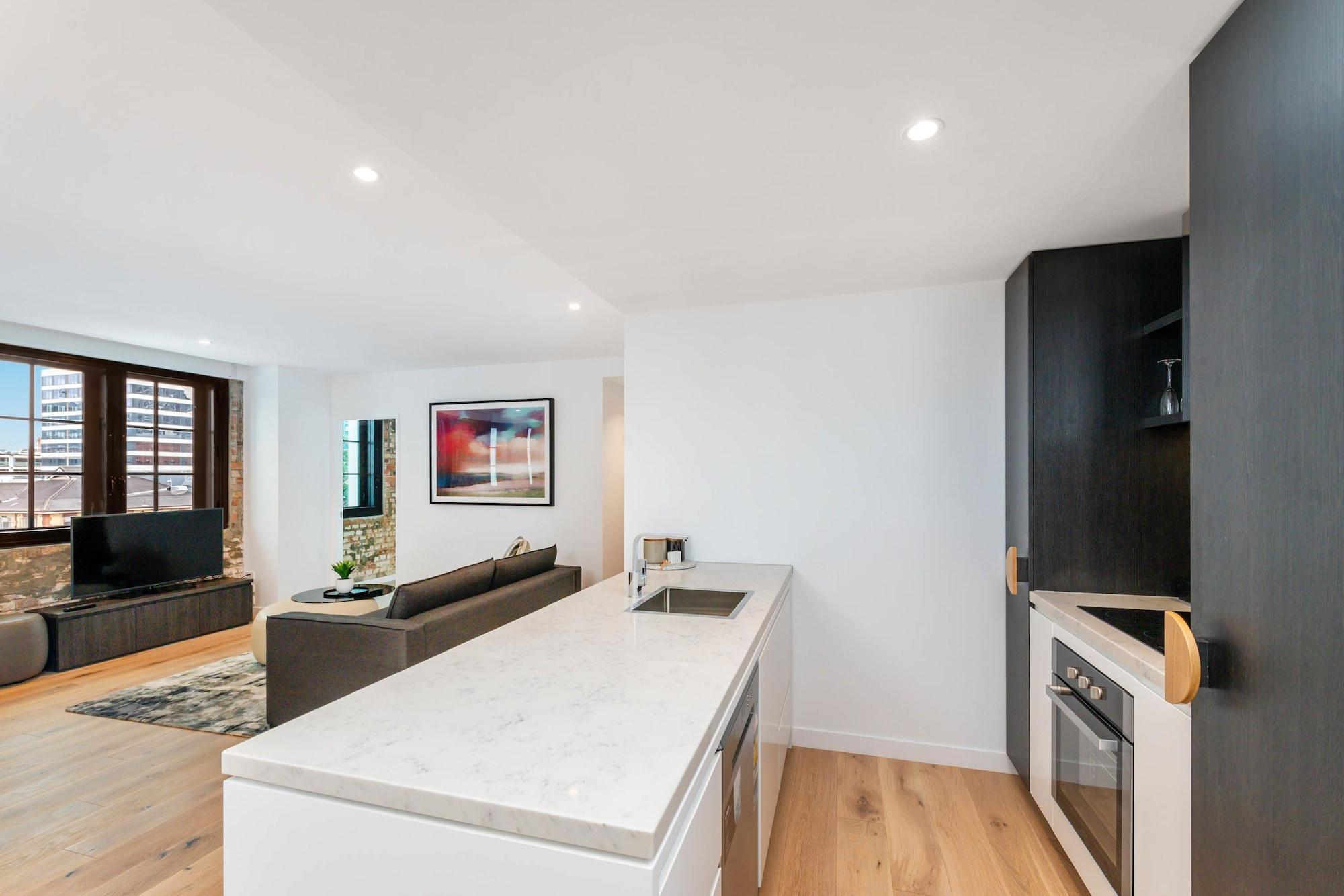Fv By Peppers Aparthotel Brisbane Luaran gambar The kitchen and living area of a typical apartment