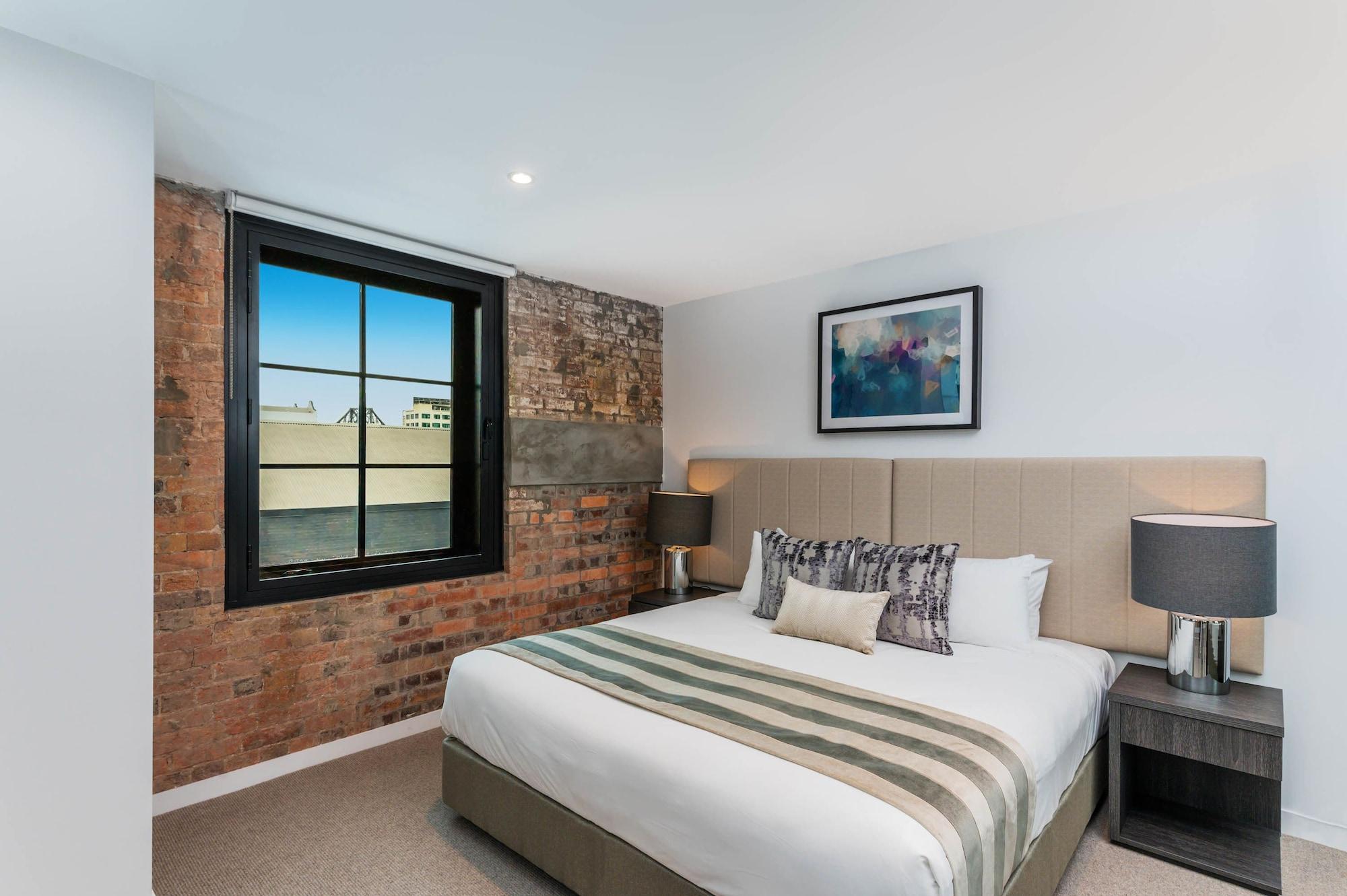 Fv By Peppers Aparthotel Brisbane Luaran gambar A bedroom at the hotel